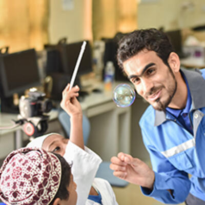 Staff volunteer in “Science of a Refinery”